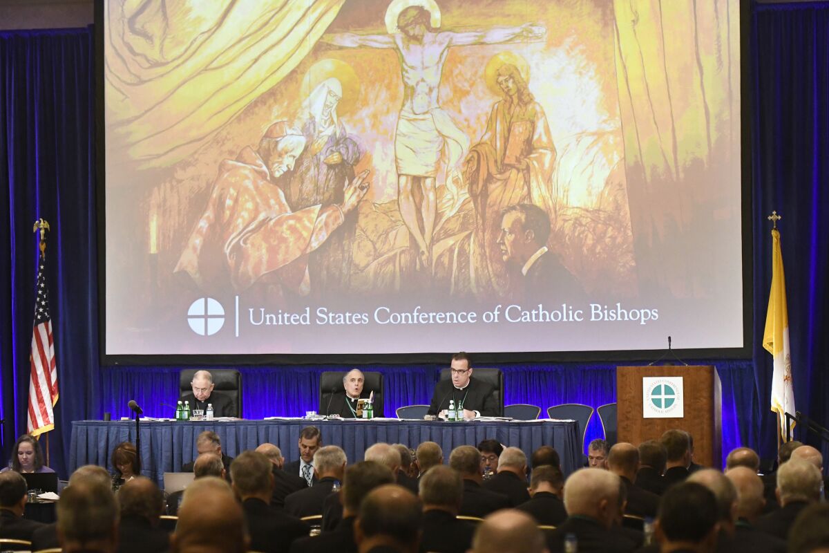 FILE - The United States Conference of Catholic Bishops holds its Fall General Assembly meeting on Tuesday, Nov. 12, 2019 in Baltimore. While some US Catholic bishops continue to denounce President Joe Biden for his support of legal abortion, their conference as a whole is likely to avoid direct criticism of him at its upcoming national meeting. (AP Photo/Steve Ruark, File)