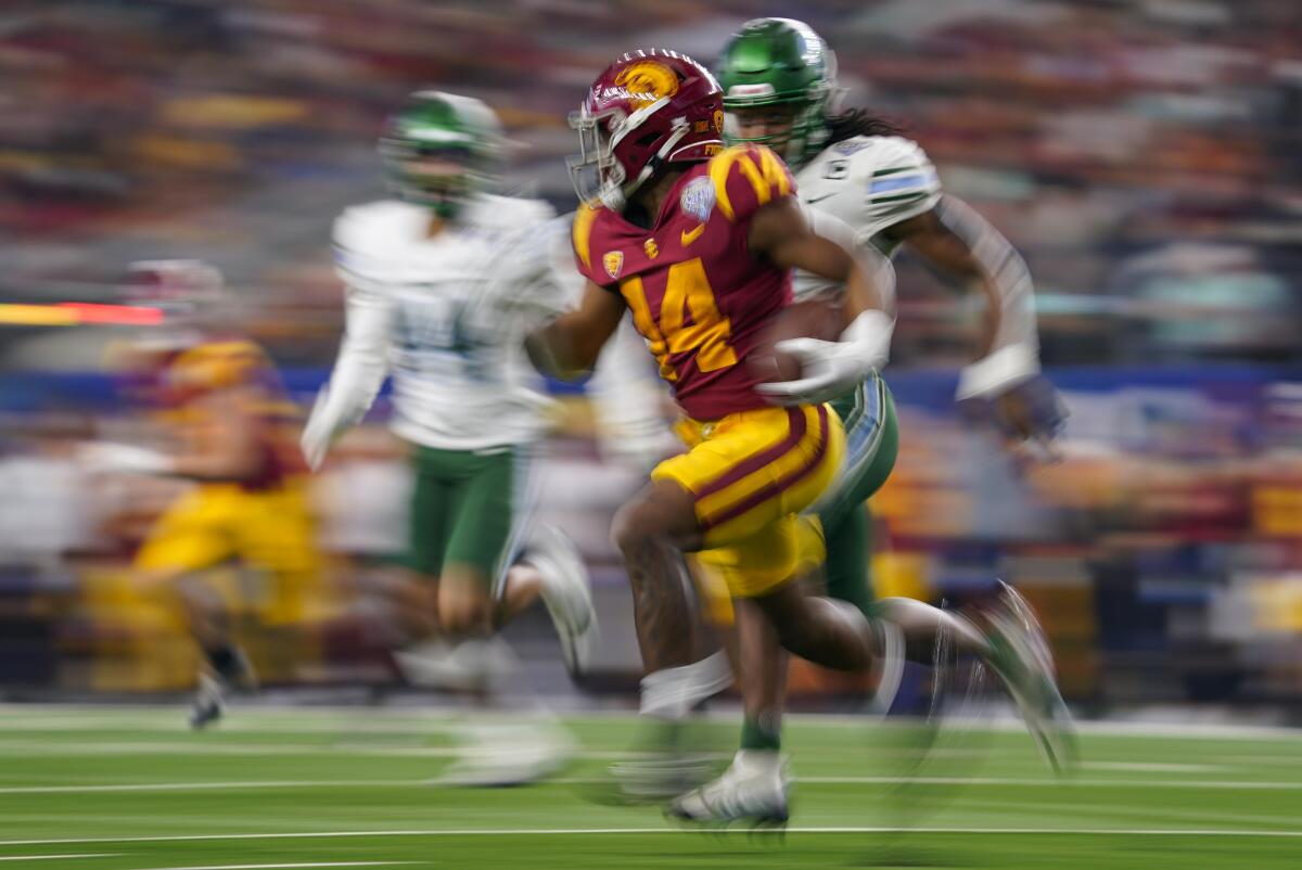 USC running back Raleek Brown (14) runs with the ball during the second half of the Cotton Bowl against Tulane