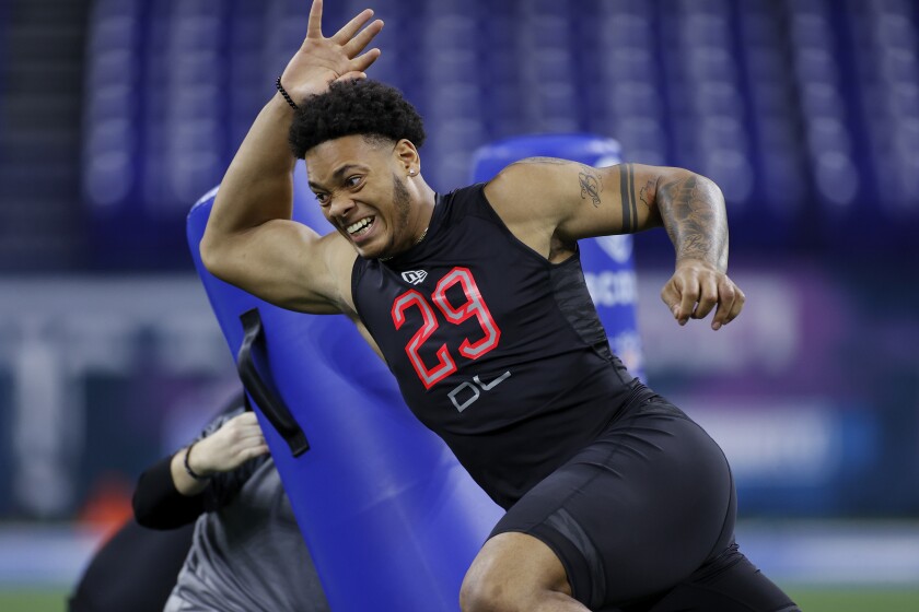 Defensive lineman Yetur Gross-Matos of Penn State runs a drill during the NFL combine.