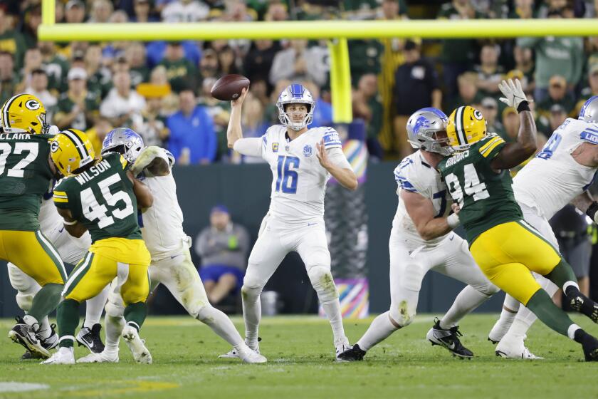 Detroit Lions quarterback Jared Goff (16) throws during a NFL football game against the Green Bay Packers Thursday, Sept. 28, 2023, in Green Bay, Wis. (AP Photo/Jeffrey Phelps)