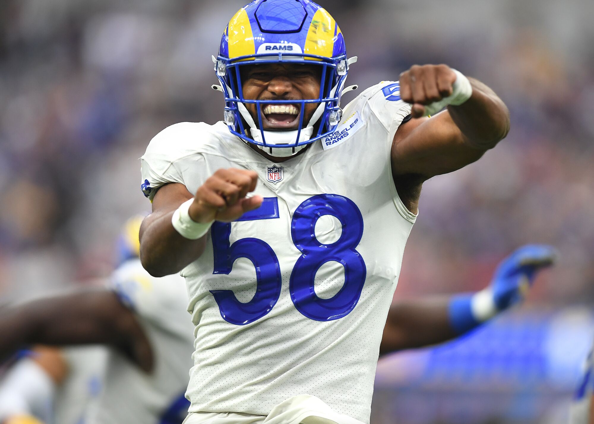 Rams linebacker Justin Hollins celebrates after stopping the Buccaneers on third down.