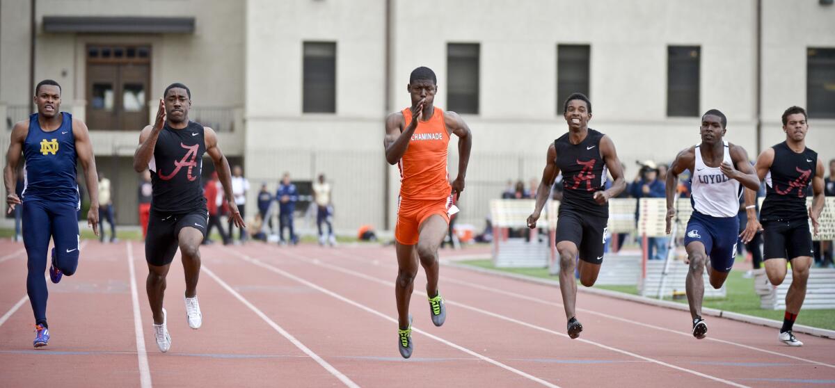 Chaminade junior T.J. Brock, center, runs in the 100-meter sprint during the Mission League track finals at Occidental College. Brock won the race with a time of 10.45 seconds.