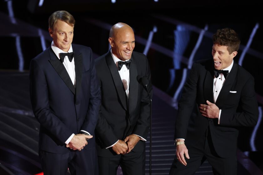 HOLLYWOOD, CA - March 27, 2022. (L-R) Tony Hawk, Kelly Slater and Shaun White present during the show at the 94th Academy Awards at the Dolby Theatre at Ovation Hollywood on Sunday, March 27, 2022. (Myung Chun / Los Angeles Times)