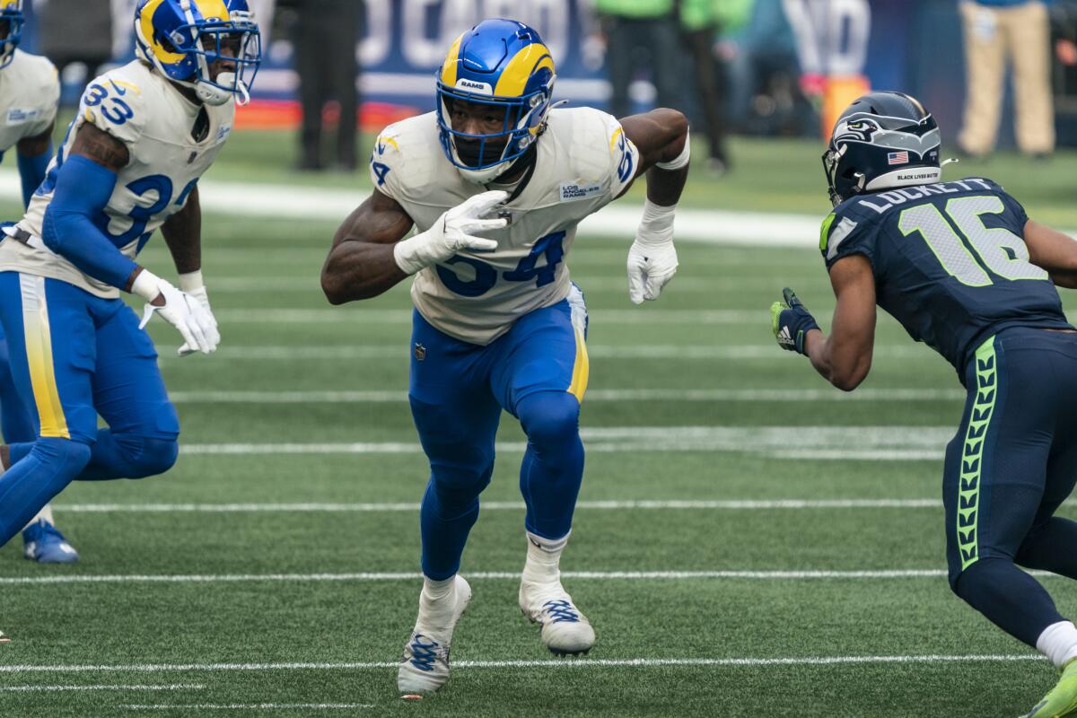 Rams linebacker Leonard Floyd follows a play during a playoff game against the Seahawks.