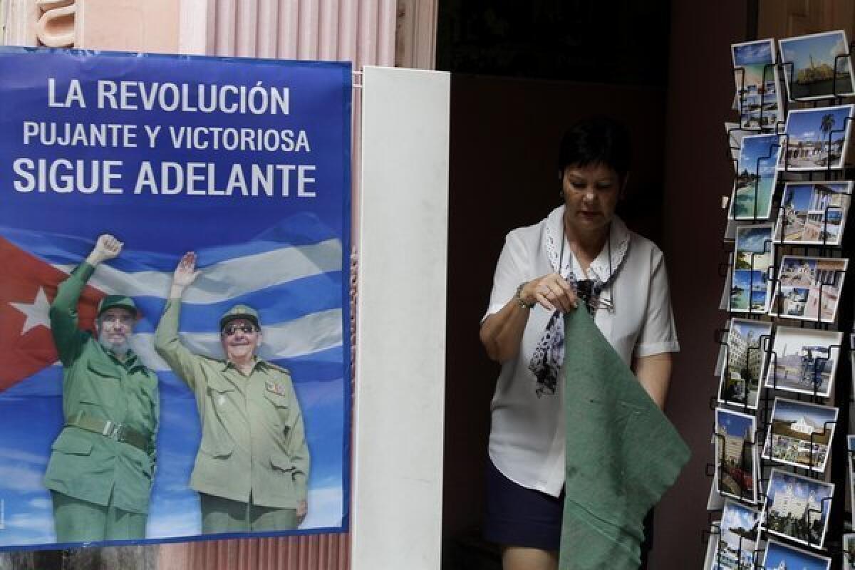 A poster at a state-owned souvenir shop in Havana depicts Fidel and Raul Castro, in healthier days, vowing that "The Revolution forcefully and victoriously moves ahead." A U.S. embargo against Cuba was denounced by the U.N. General Assembly on Tuesday by a vote of 188-3, the 21st consecutive global censure of Washington for its isolationist policy toward the communist-ruled island.