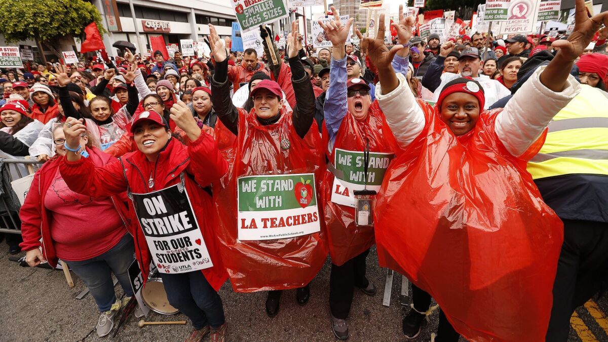 Teachers and supporters cheer during a rally in downtown Los Angeles on Jan. 15.