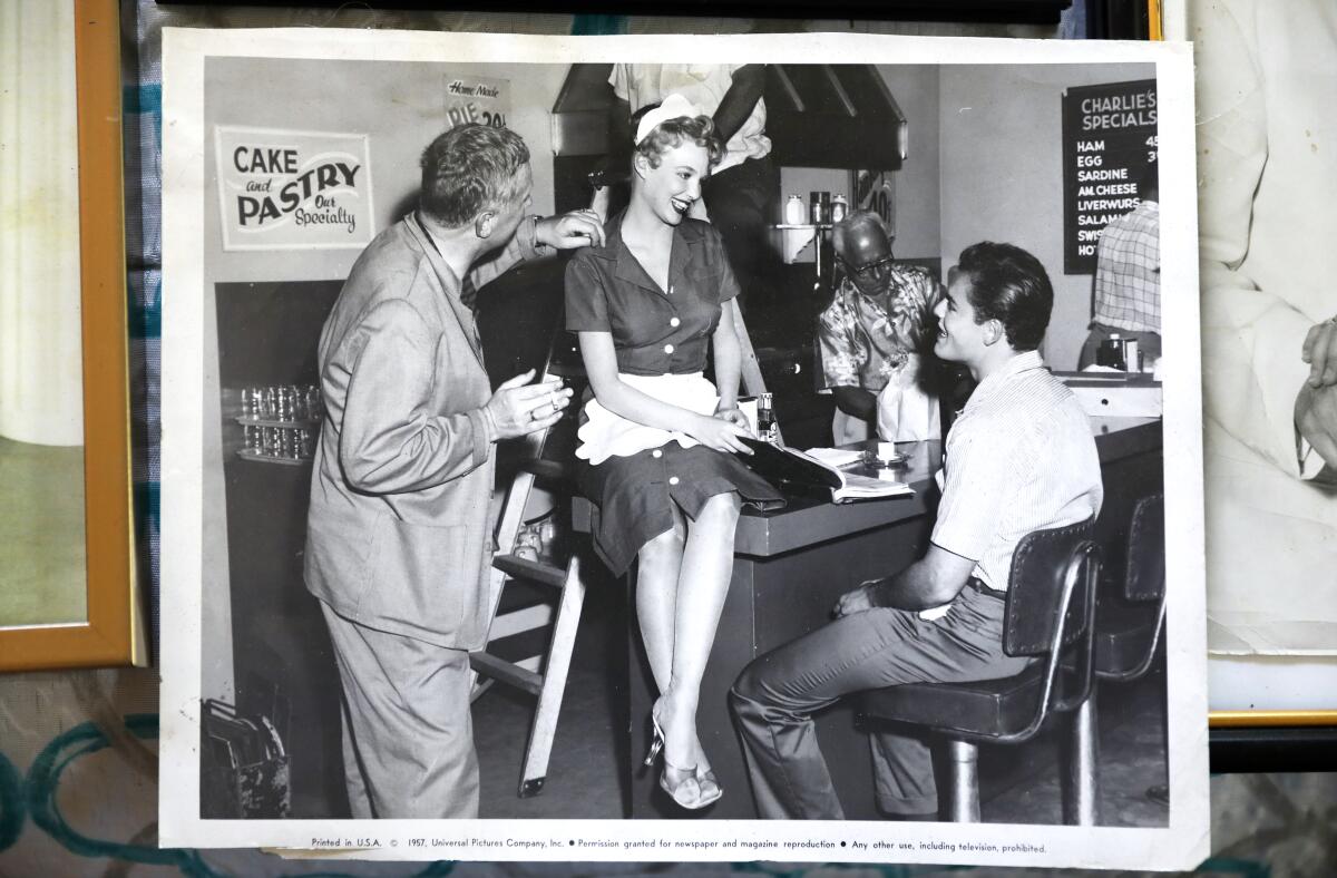 A photograph of Reita Green, center, as a young actress in 1957 is displayed at her home in Burbank.