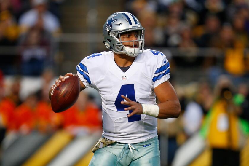 Dallas' Dak Prescott drops back to pass against the Pittsburgh Steelers on Sunday.