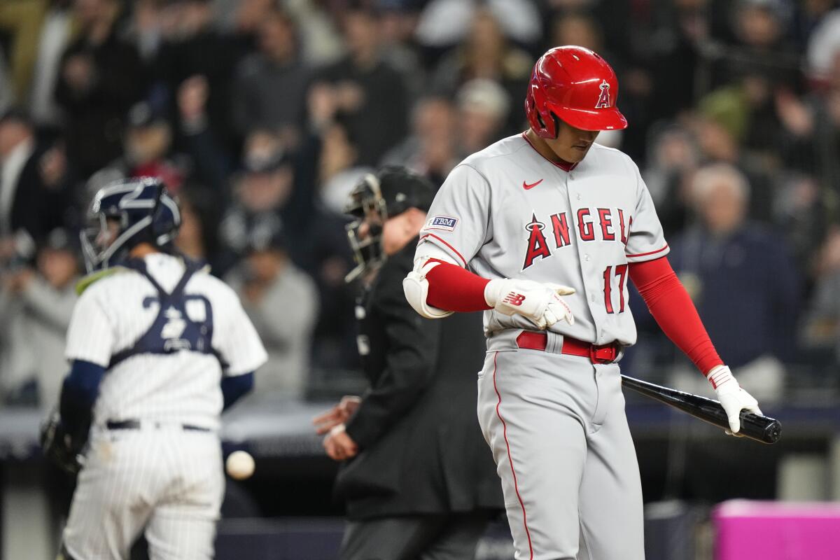 Angels' Shohei Ohtani reacts after striking out during the seventh inning against the New York Yankee in New York.