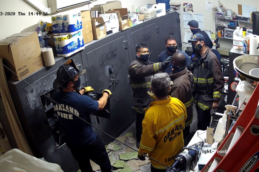 Aug. 2020 surveillance footage shows firefighter receiving treatment following a raid at the Zide Door Church in Oakland.