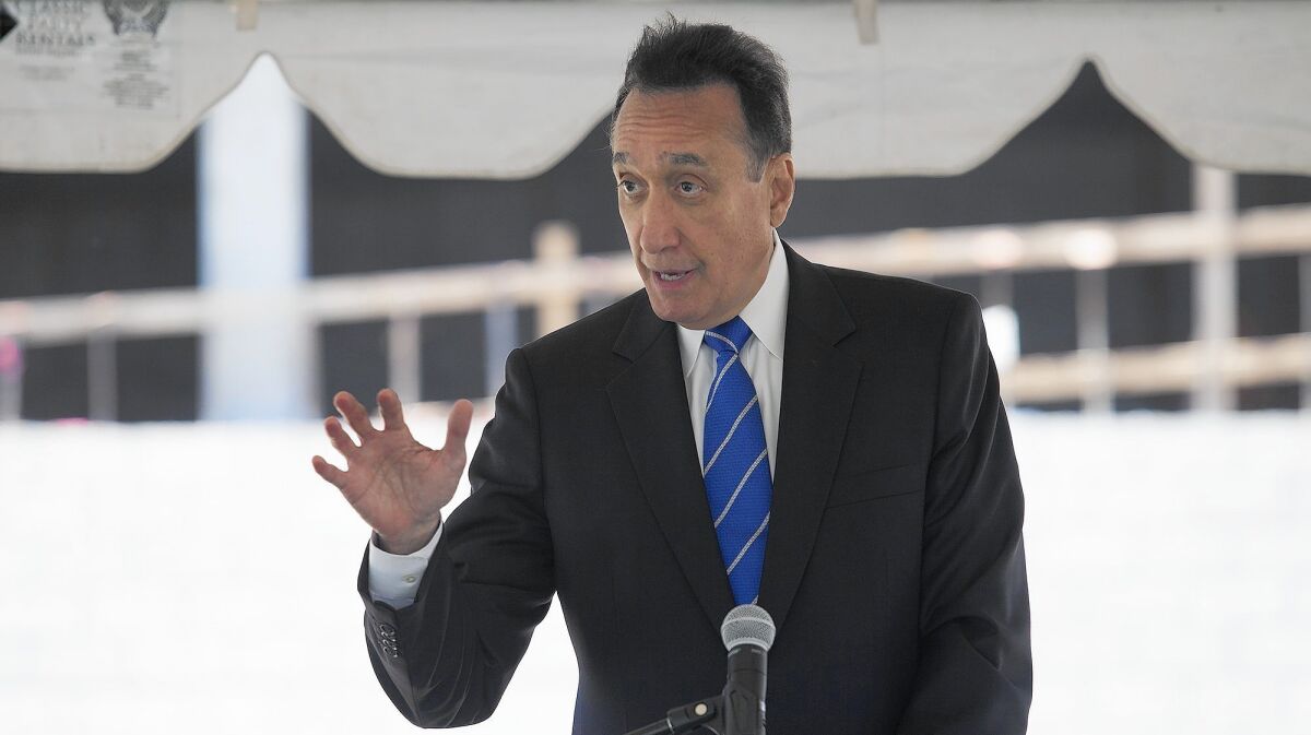 Henry Cisneros, chairman of development firm CityView and a former U.S. Department of Housing and Urban Development secretary, speaks Wednesday during a ceremony for CityView's 240-unit apartment project called Baker Block in Costa Mesa.