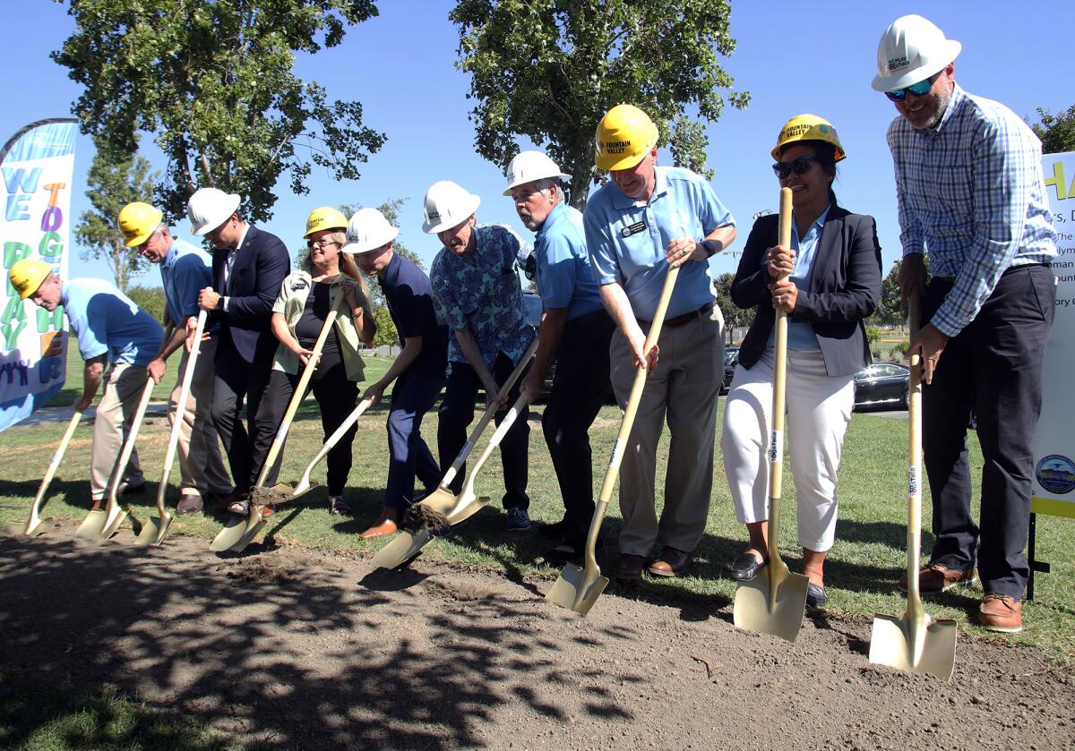 The Fountain Valley City Council and local dignitaries take part in the universally accessible playground groundbreaking.