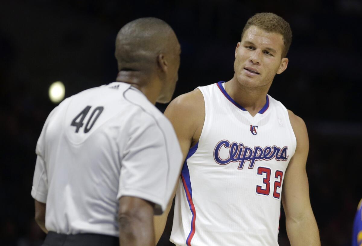 The Clippers' Blake Griffin gets a technical foul form referee Leon Wood during a preseason game against the Golden State Warriors at Staples Center on Oct. 7.