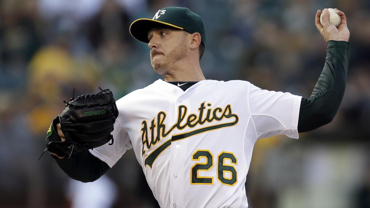 Oakland Athletics starter Scott Kazmir delivers a pitch against the New York Mets on Aug. 19. In three seasons, Kazmir has gone from one of the worst pitchers in baseball to one of the league's best.