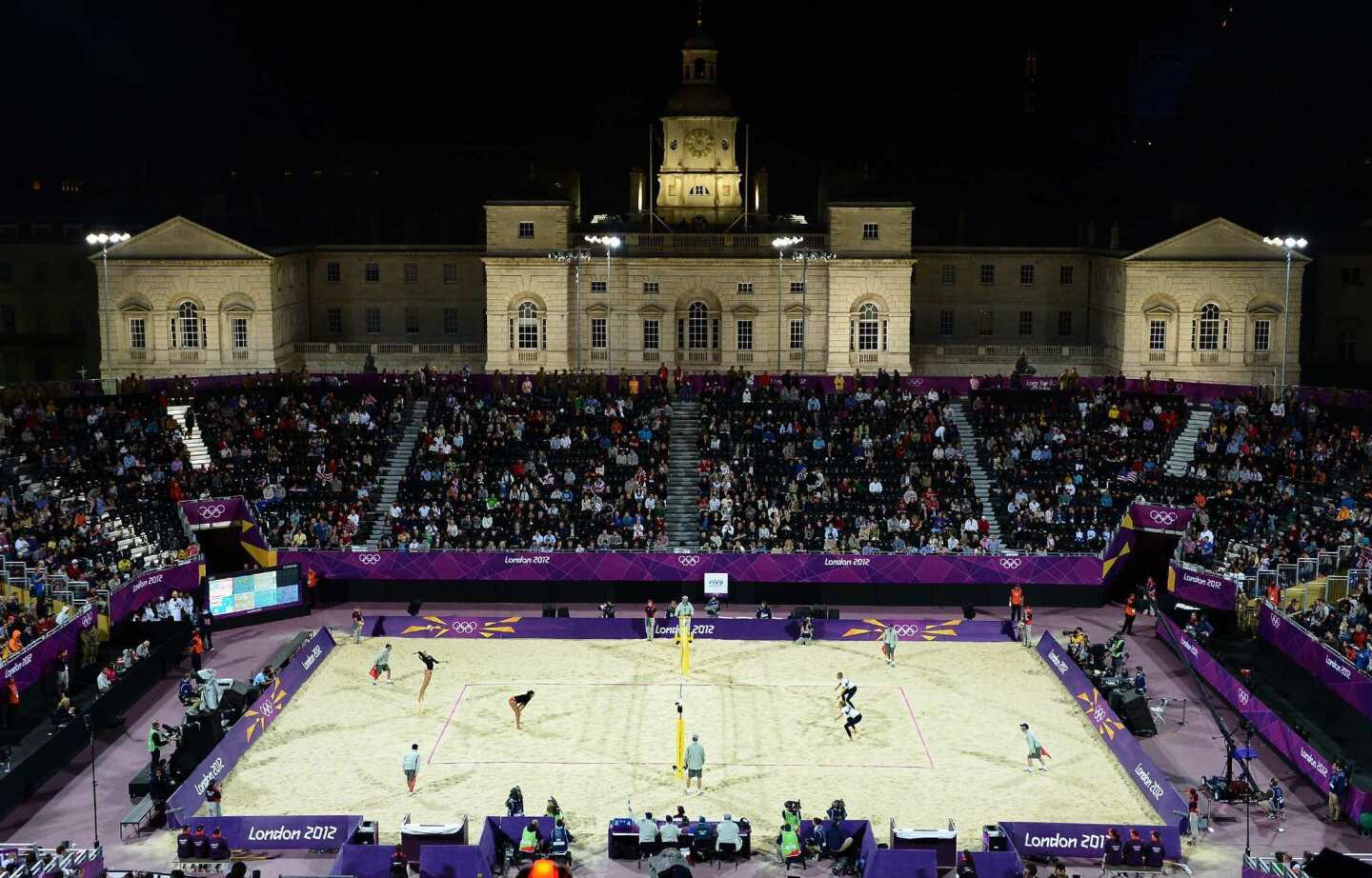 The U.S. women's team of Misty May-Treanor and Kerri Walsh challenge Australia's Nat Cook and Tamsin Hinchley during a beach volleyball event at the Horse Guards Parade and 10 Downing Street, the home of the British prime minister.