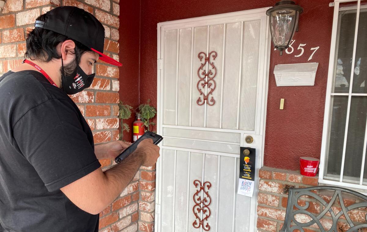 Cesar Bramblia spent the afternoon knocking on doors in a Las Vegas neighborhood stumping for Biden/Harris ticket. 