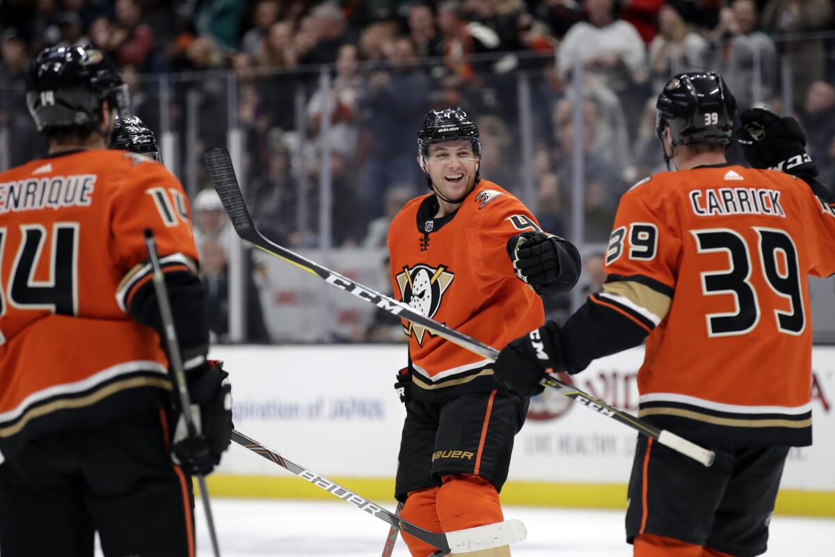 The Ducks' Cam Fowler, center, celebrates his goal in his team's 4-3 win over the Golden Knights.