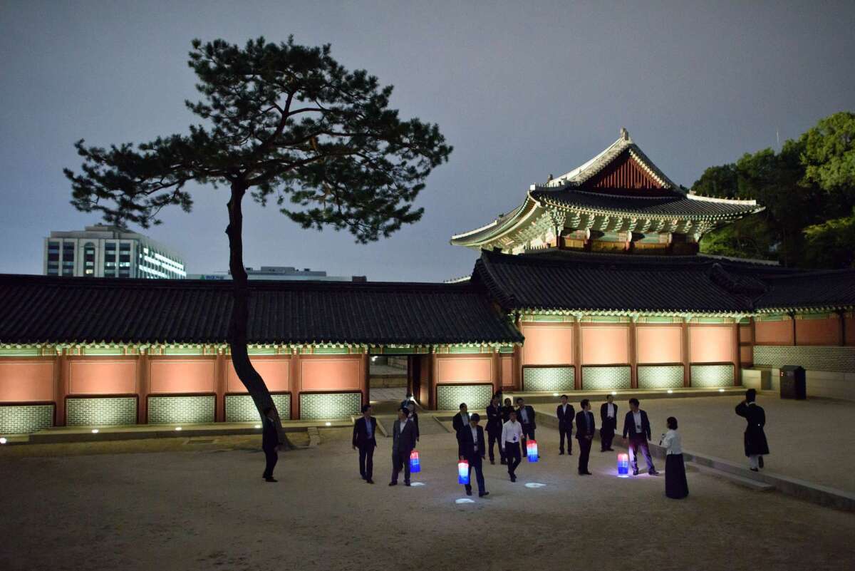 The Changdeokgung Palace complex in Seoul is seen during a moonlight tour.
