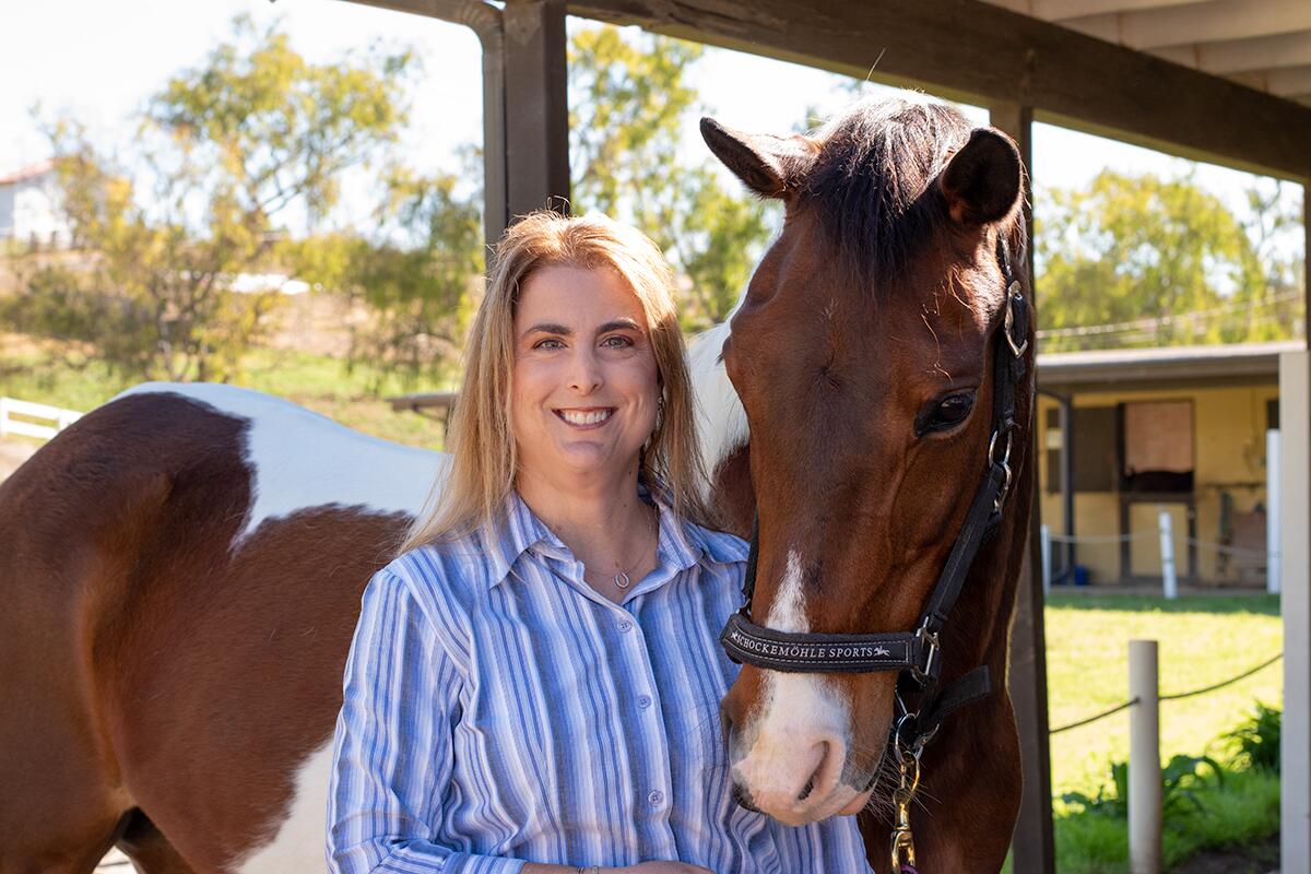 Tufia Steidle, Psy.D., head of the Equine-Assisted Therapy Program at Aspiring Families