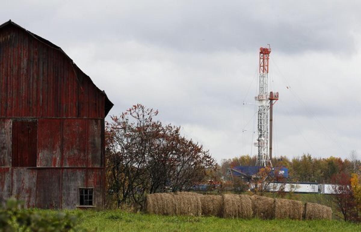 A drilling rig is set up near a barn in Springville, Pa., to tap gas from the Marcellus Shale.