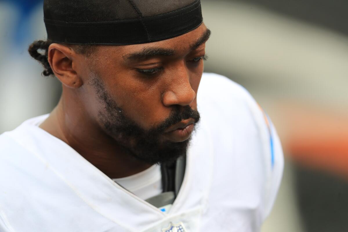 Chargers quarterback Tyrod Taylor walks off the field.