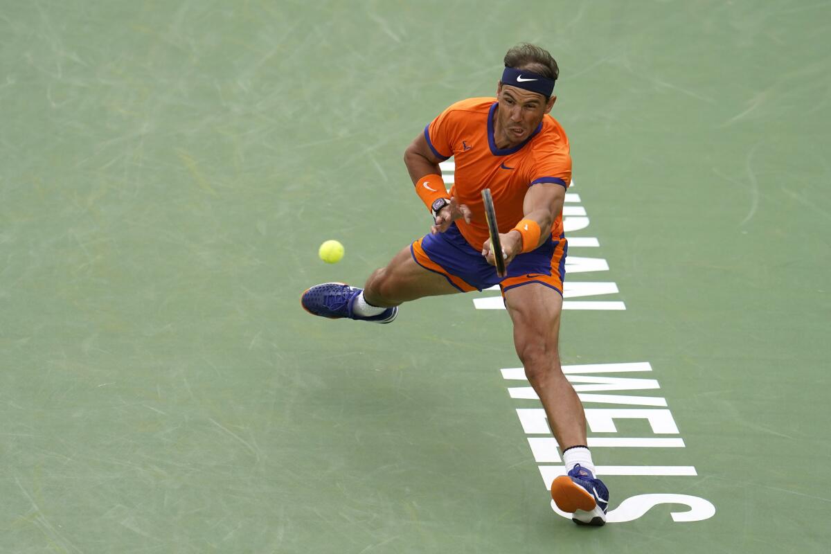 Rafael Nadal returns a shot during his semifinal victory over Carlos Alcaraz on Saturday.