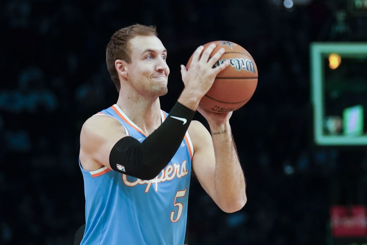The Clippers' Luke Kennard competes in the All-Star weekend three-point shootout Saturday night in Cleveland.