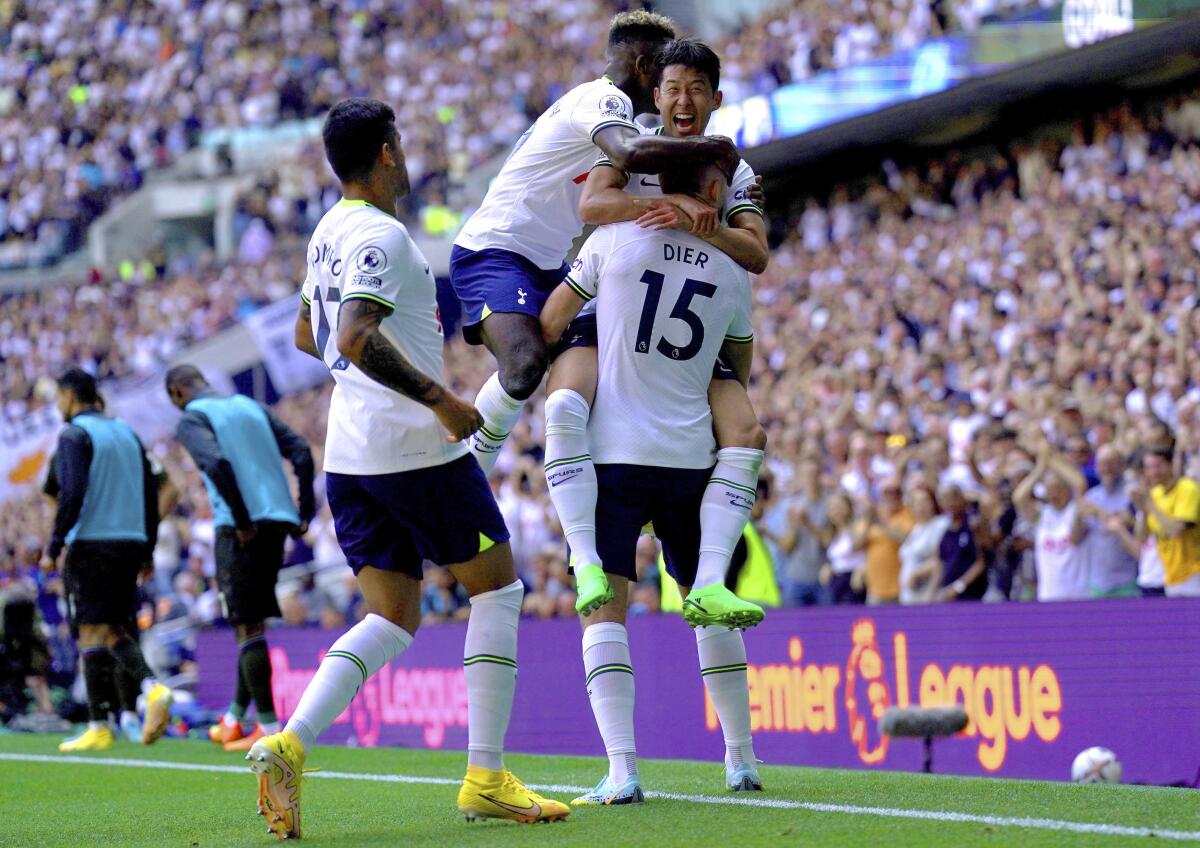 Tottenham Hotspur's Eric Dier celebrates with his teammates after scoring their side's second goal of the game, during the English Premier League soccer match betten Tottenham Hotspur and Southampton at Tottenham Hotspur Stadium, London, Saturday Aug. 6, 2022. (Kirsty O'Connor/PA via AP)