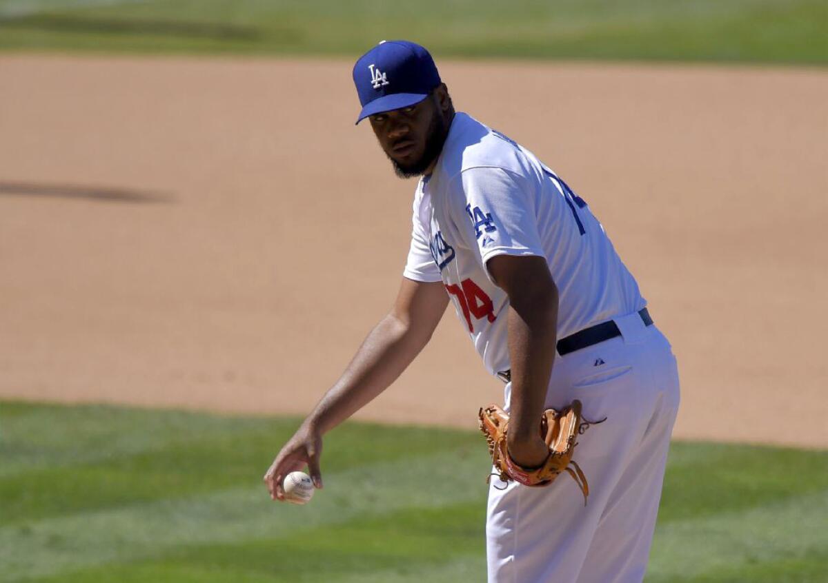 Dodgers closer Kenley Jansen gets ready to pitch during the eighth inning of a game against the Cincinnati Reds on Aug. 16.