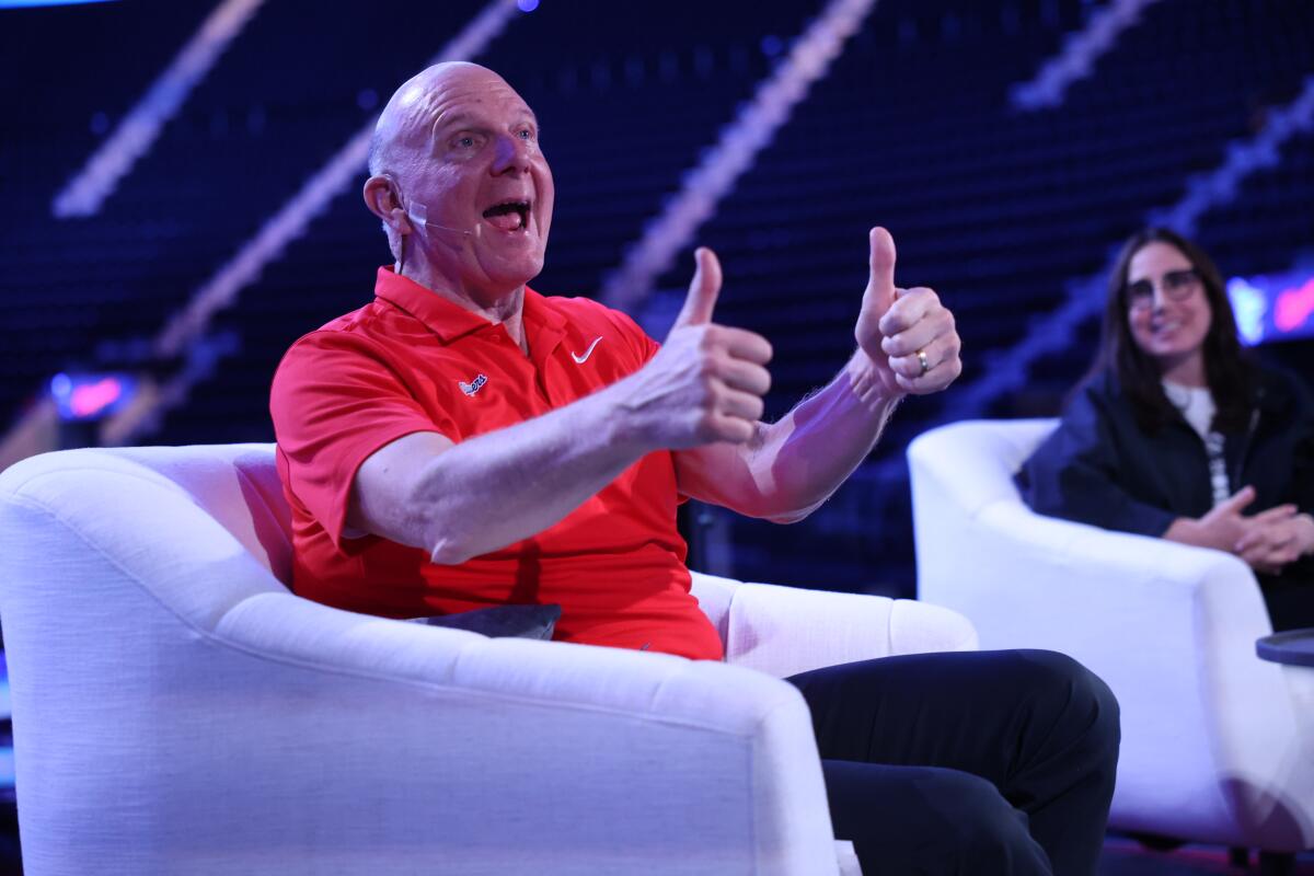 Clippers owner Steve Ballmer gives a double thumbs-up while talking about the Intuit Dome's Halo Board on Friday.