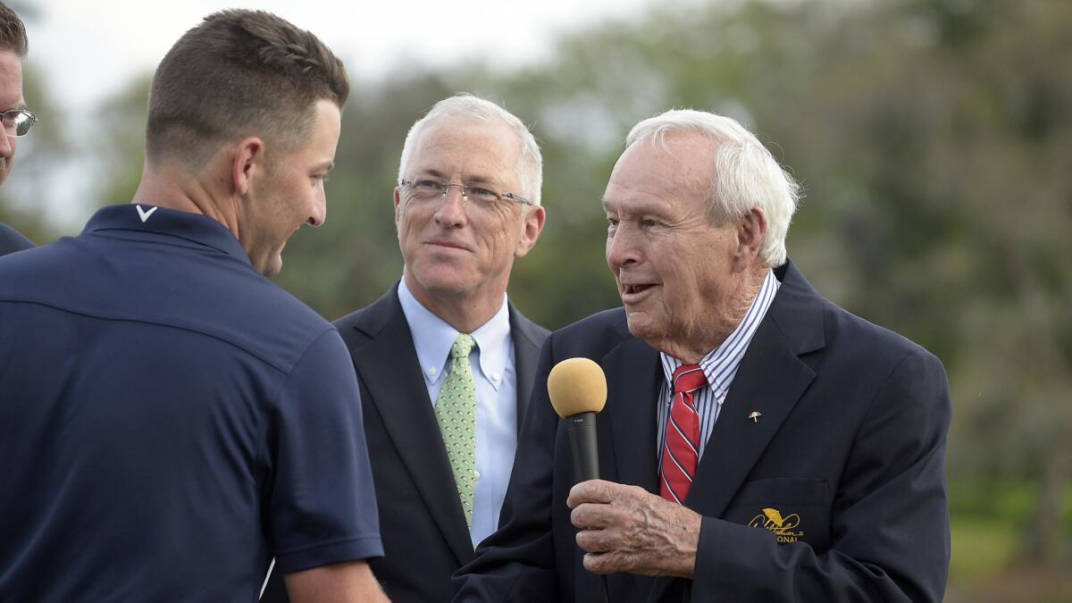 Arnold Palmer, right, congratulates Matt Every after his victory at the Arnold Palmer Invitational in Orlando, Fla., on March 22.