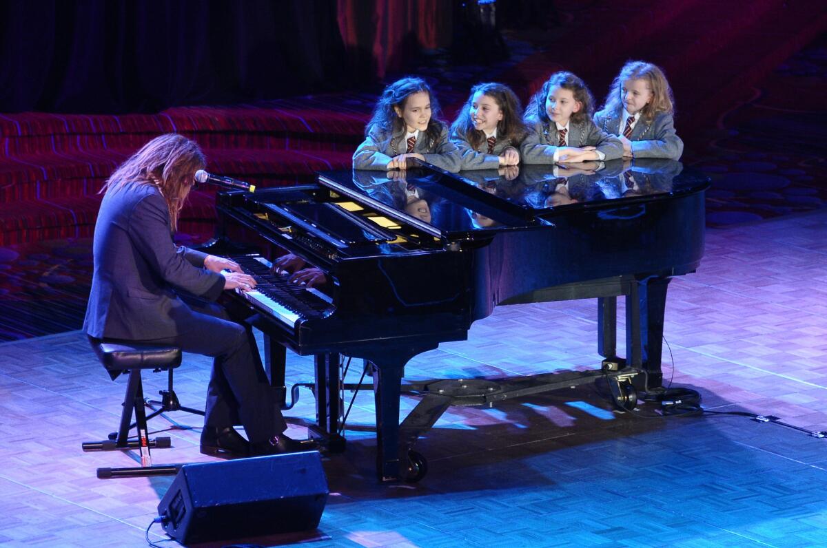 Writer-composer Tim Minchin performs with the cast of "Matilda" at the Actors Fund's annual gala, which honored Robert De Niro, in New York City.