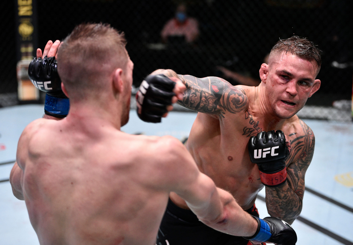 Dustin Poirier, right, punches Dan Hooker during a UFC fight in Las Vegas on June 27.