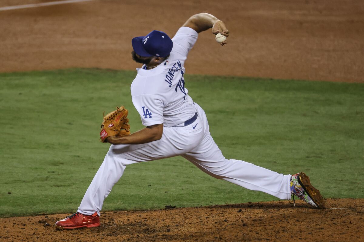 Dodgers closer Kenley Jansen delivers during the ninth inning of a 4-2 win.