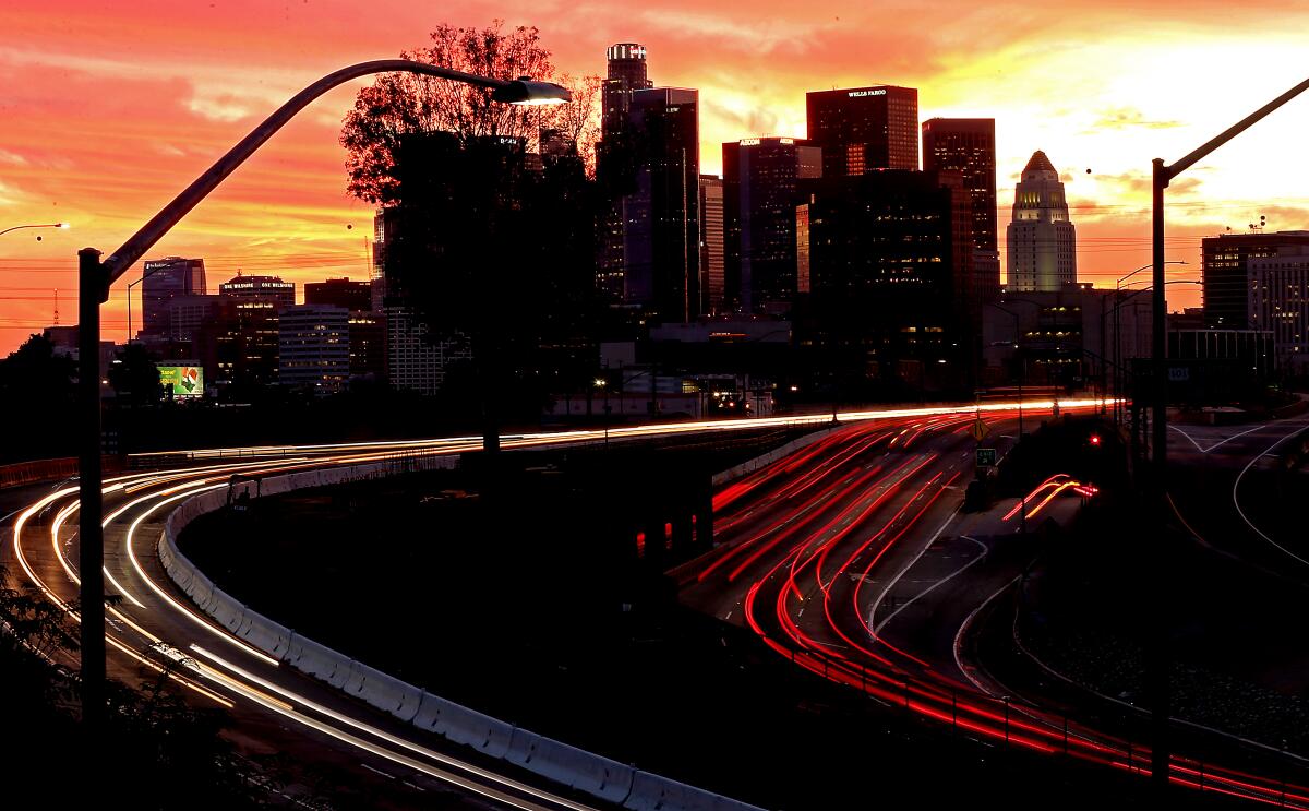 Traffic streams along the interchange of the Hollywood and San Bernardino freeways in downtown Los Angeles.