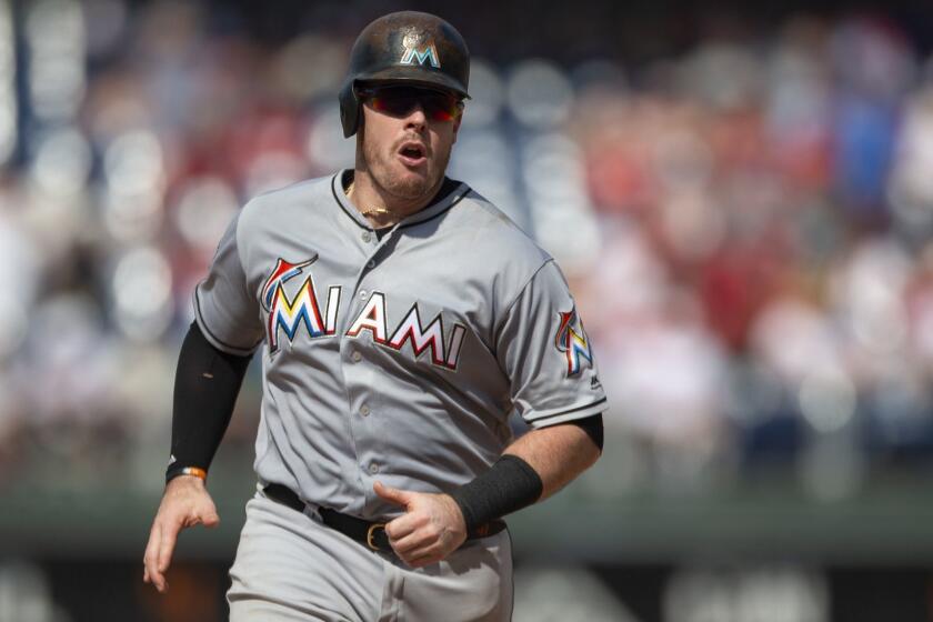 Miami Marlins' Justin Bour runs the bases after hitting a home run in the seventh inning of a baseball game against the Philadelphia Phillies, Sunday, Aug. 5, 2018, in Philadelphia. The Phillies won 5-3. (AP Photo/Laurence Kesterson)