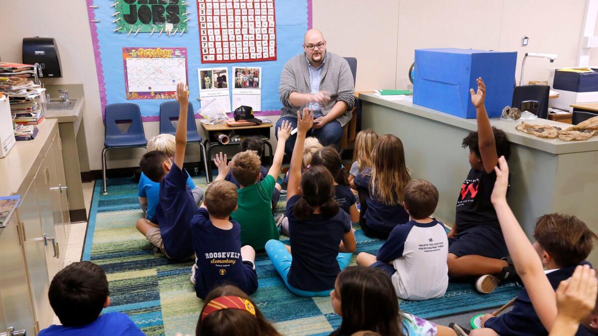 Burbank school board president Steve Ferguson talked to John Pike's third-grade class at Roosevelt Elementary School on Friday about being a leader during the school's annual celebration of Theodore Roosevelt's birthday.