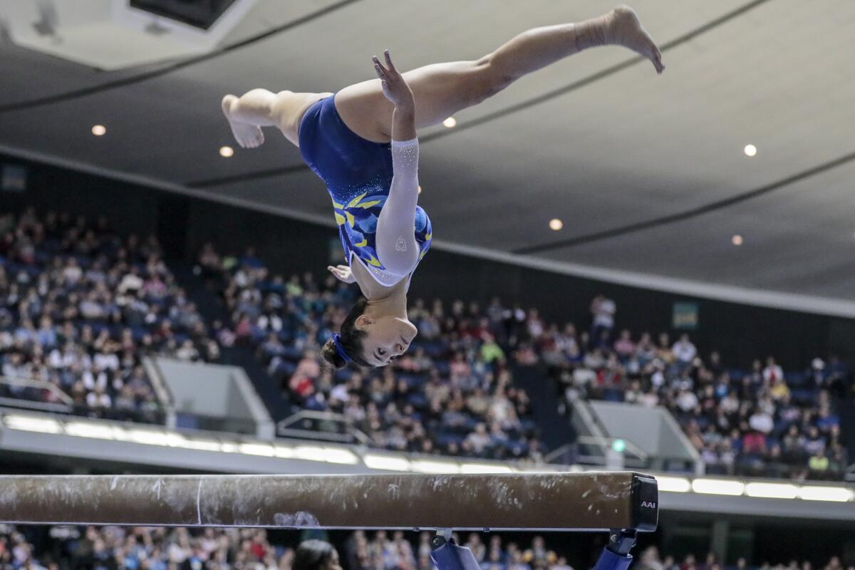 UCLA's Kyla Ross competes on the balance beam at the Collegiate Challenge gymnastics meet Saturday night in Anaheim. Ross won the all-around title.