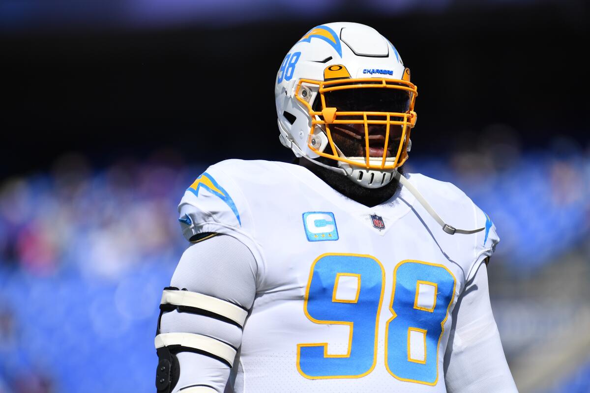 Chargers defensive tackle Linval Joseph stands on the field during a game.