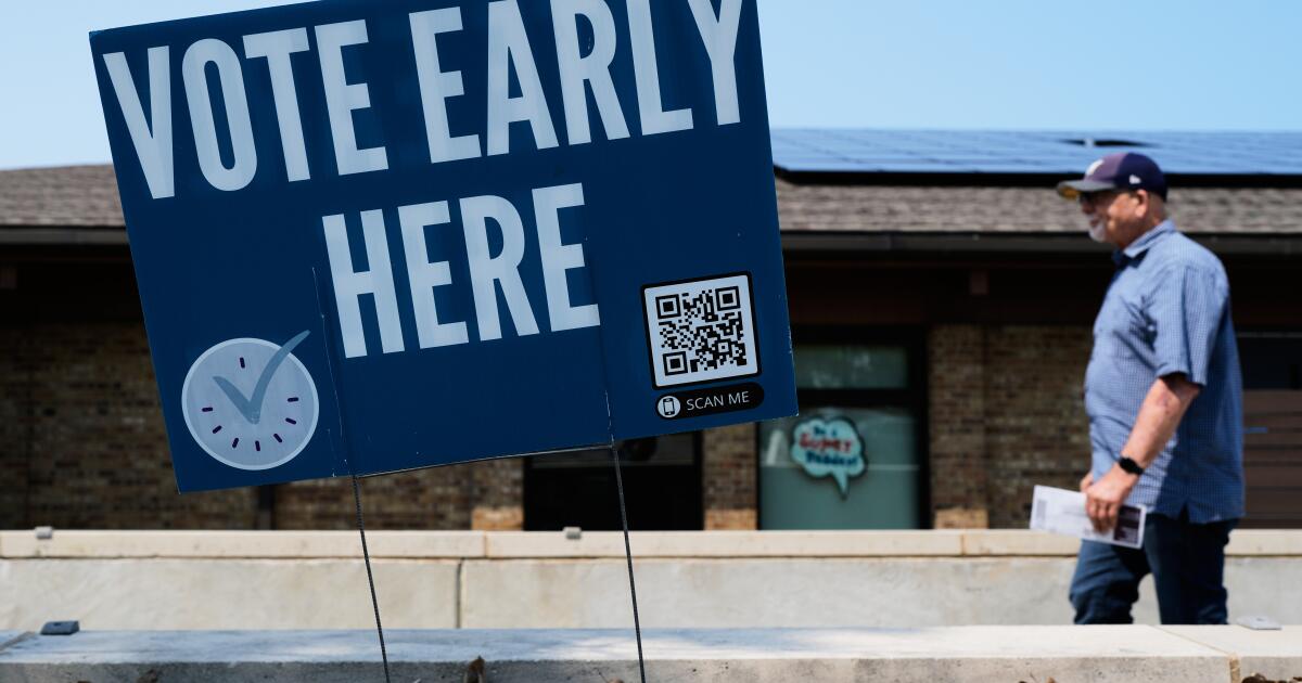 Photo: latimes.com A voter walks to polling place in Milwaukee, Tuesday, July 28, 2026. (AP Photo/Nam Y. Huh)