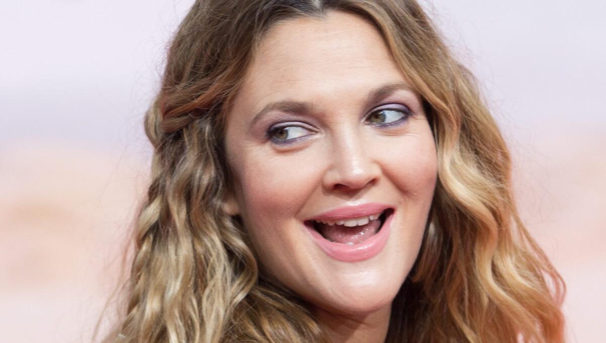 Drew Barrymore gets honest in talking about her "saggy and weird" post-baby body in an interview with Glamour.