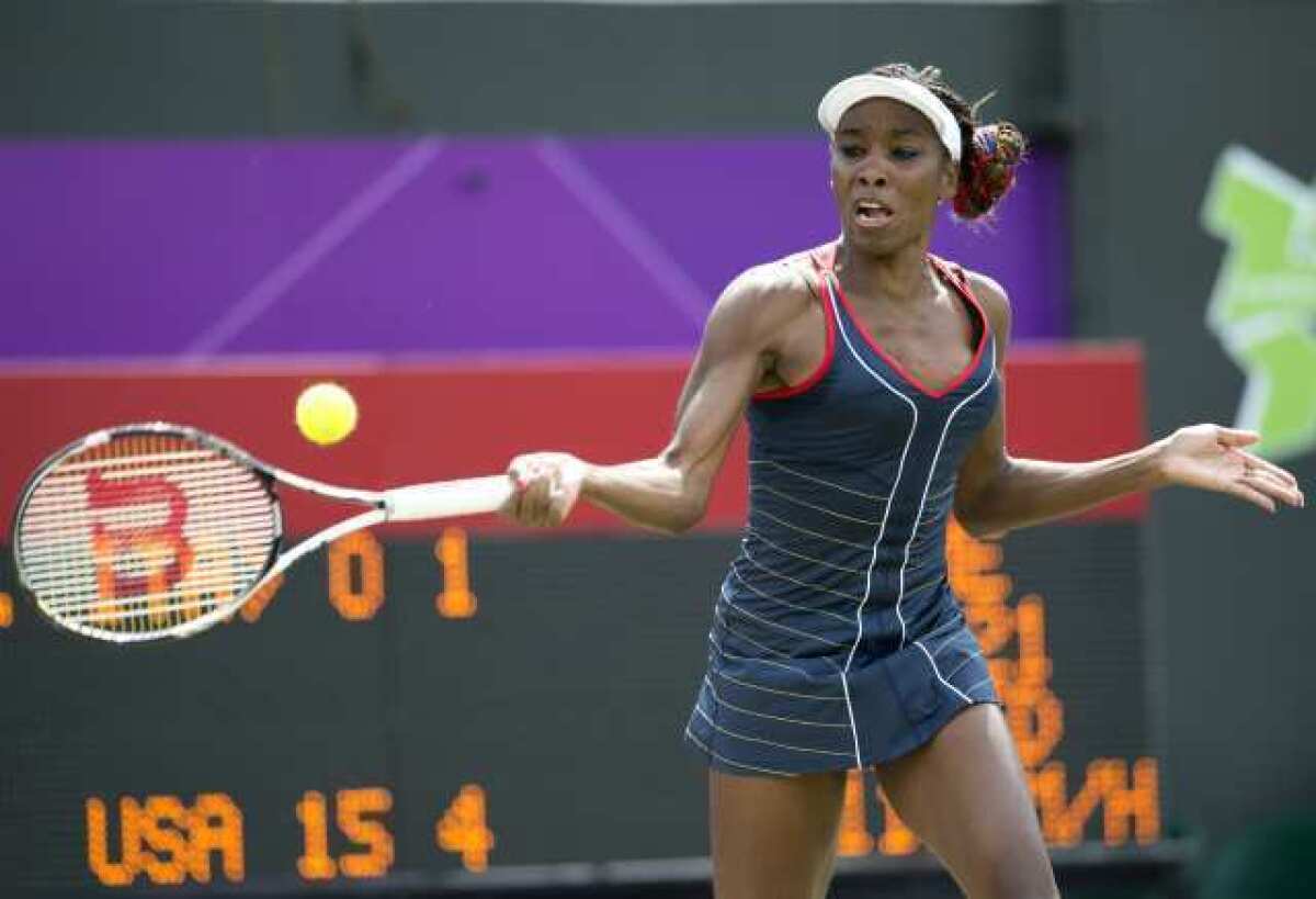 Venus Williams in action in the first round against Sara Errani of Italy.