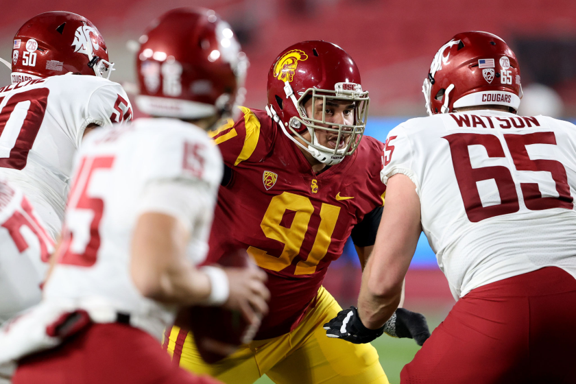 USC pass rusher Brandon Pili battles Washington State on Dec. 6.