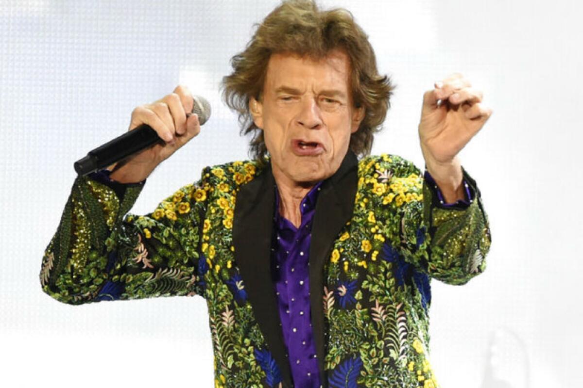 Mick Jagger performs during the Rolling Stones' concert at the Rose Bowl on Thursday.