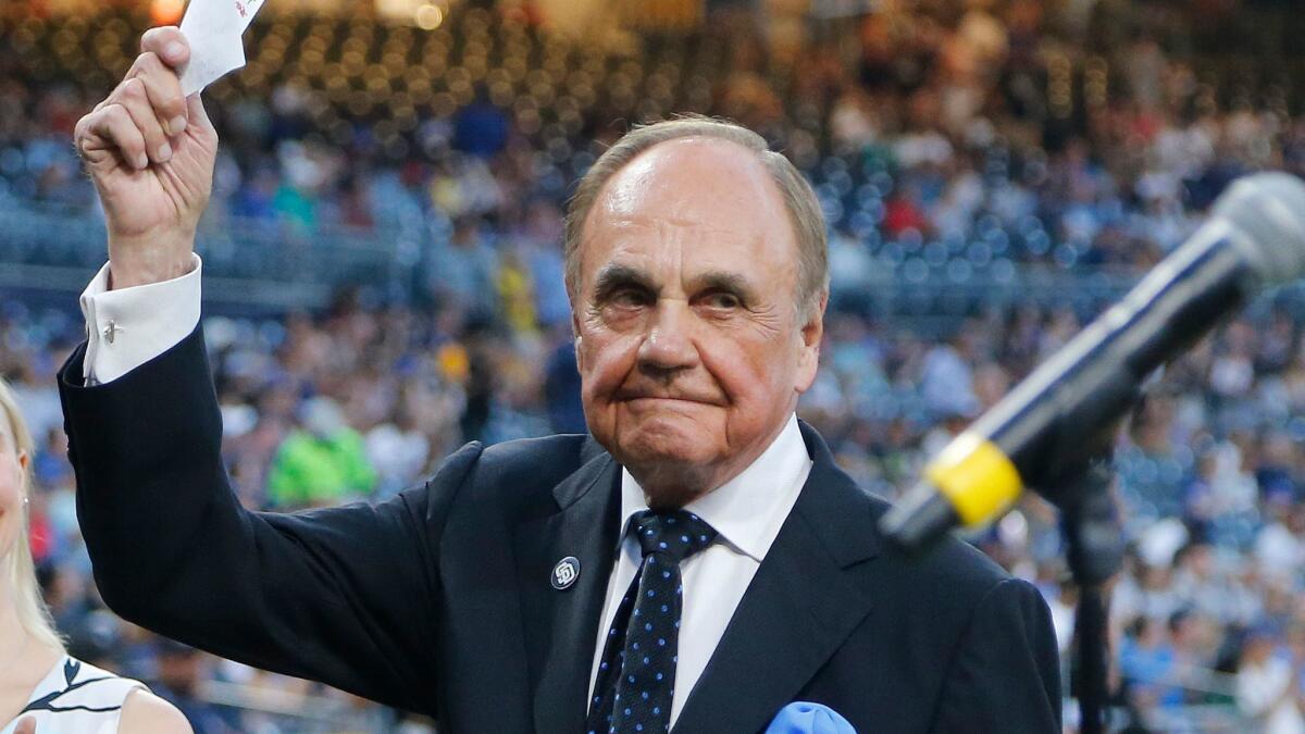 Play-by-play caller Dick Enberg waves to the crowd at a retirement ceremony prior to the San Diego Padres' final home game in 2016.