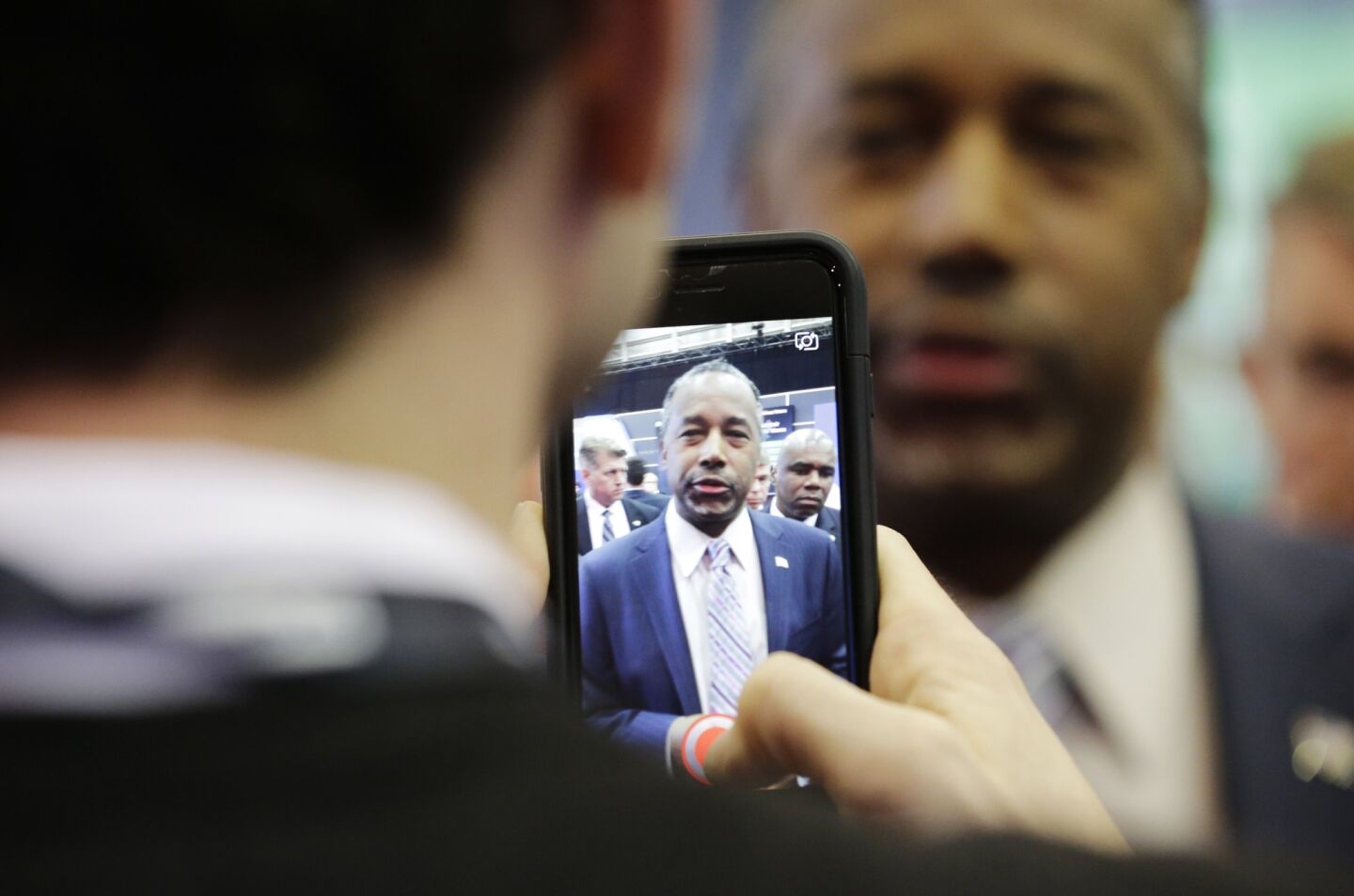 Ben Carson meets with members of the news media before the debate.