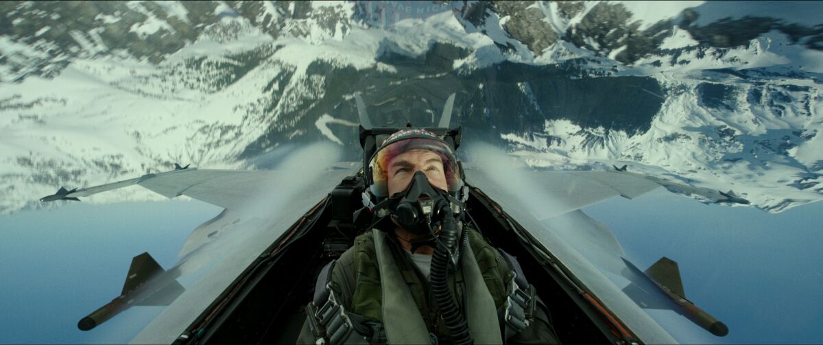 This image released by Paramount Pictures shows Tom Cruise portraying Capt. Pete "Maverick" Mitchell in a scene from "Top Gun: Maverick." Paramount Pictures on Wednesday postponed the release of the film, sending another of the fall’s top movies out of 2021 due to the rise in coronavirus cases and the delta variant. Instead of opening Nov. 19, the “Top Gun” sequel, starring Tom Cruise, will instead debut Memorial Day weekend next year, on May 27. (Paramount Pictures via AP)