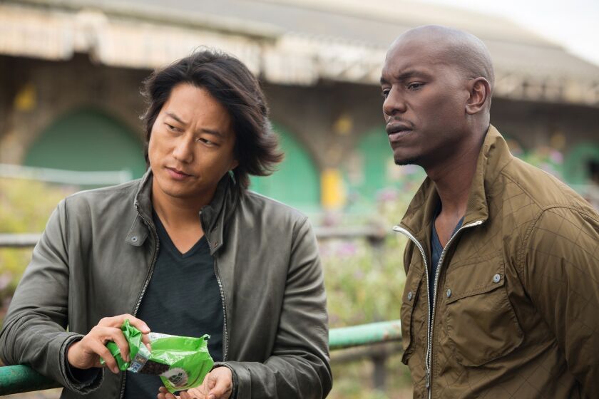 Sung Kang and Tyrese Gibson in "Fast & Furious 6."