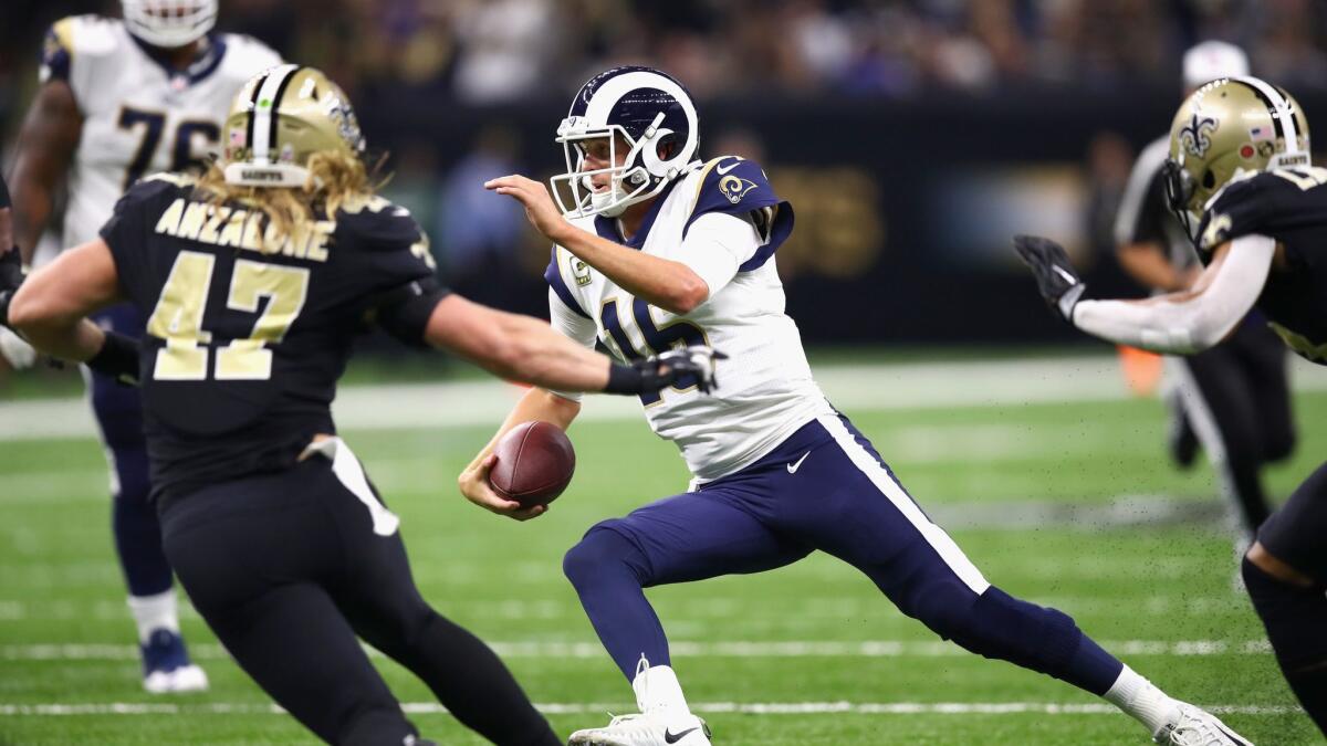 Jared Goff scrambles for yardage against the Saints
