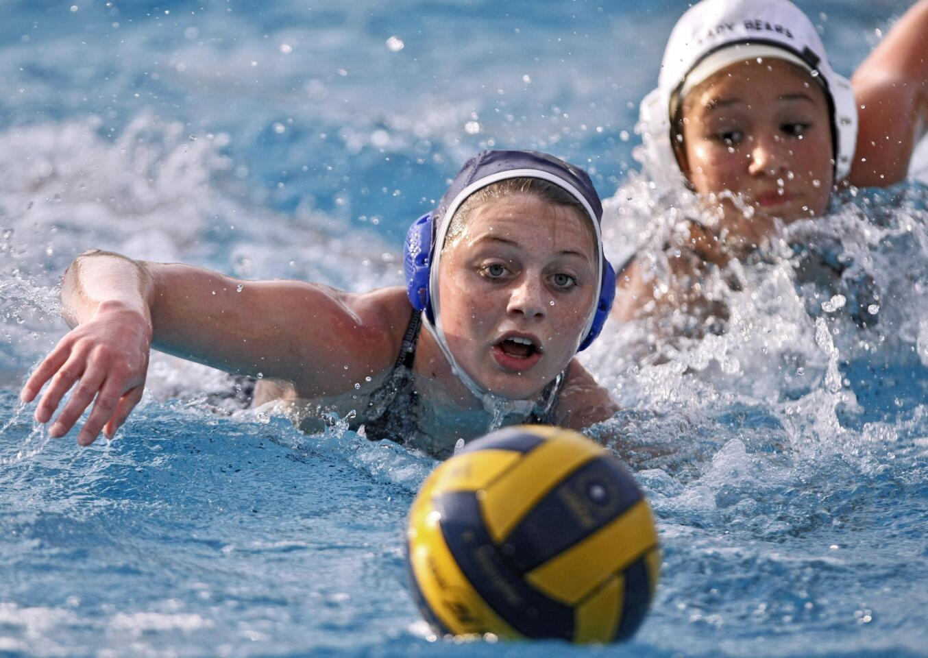 Crescenta Valley High School girls water polo player #2 Audrey Taylor chases a pass in CIF SS. Div. V semifinal match vs. Warren High School at Whittier College in Whittier on Wednesday, Feb. 26, 2014. CVHS lost the match.